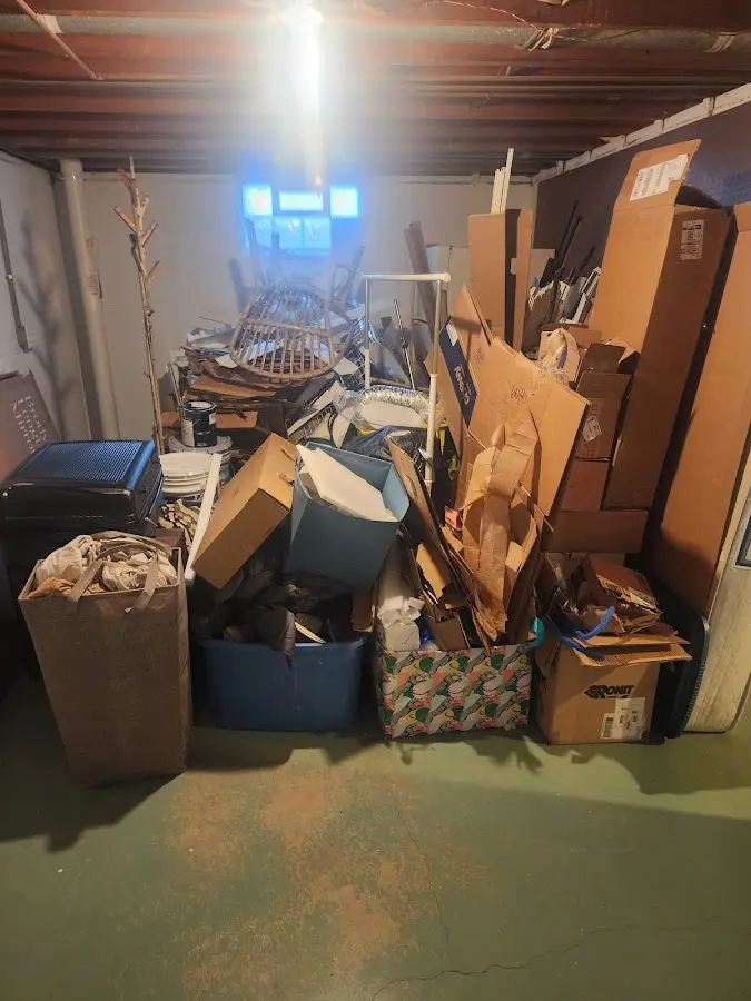 Roll-off dumpster container at job site for Roll Off Dumpster Rental in Hartland